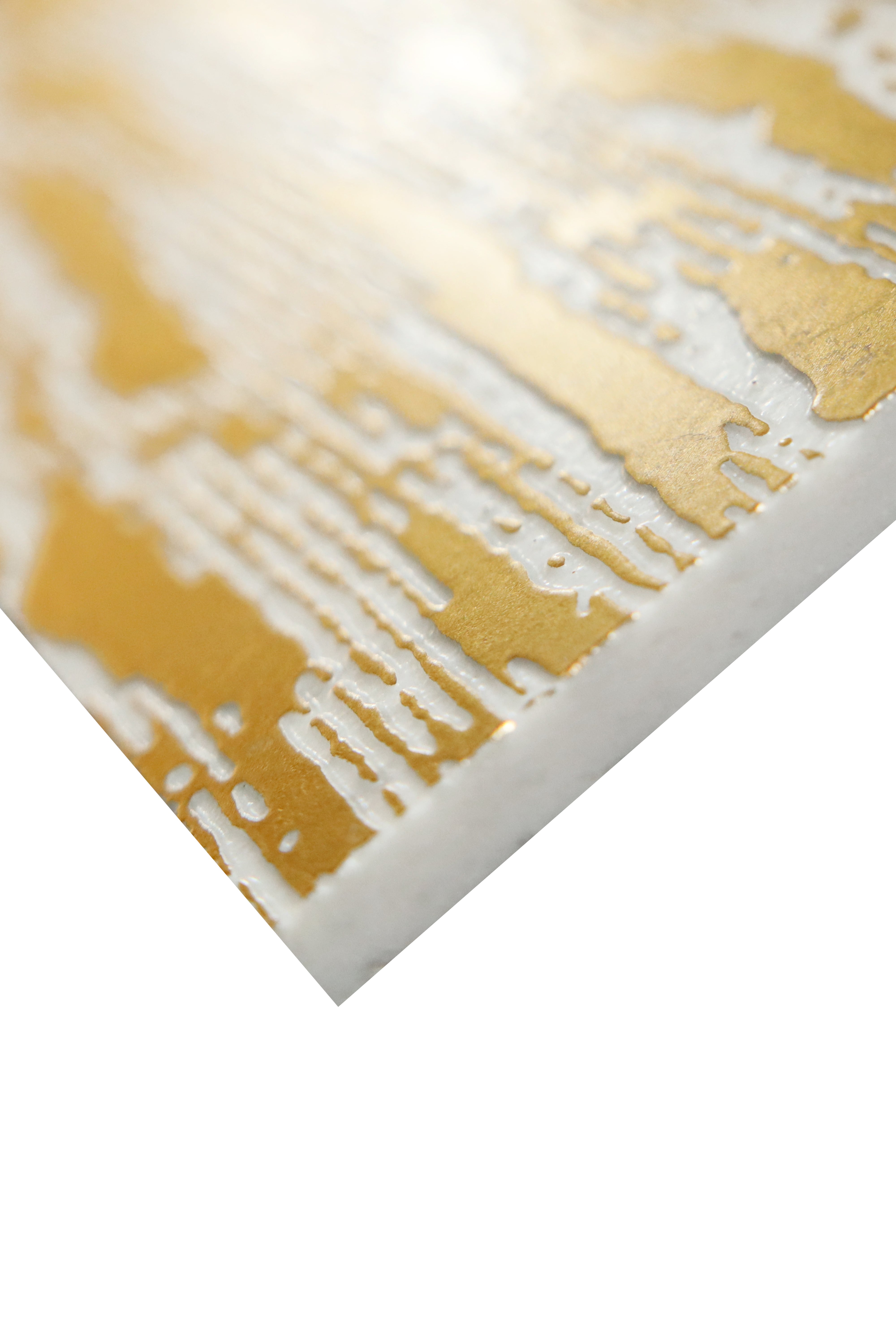 Close-up of Dore Waves marble tile showing textured gold wave pattern