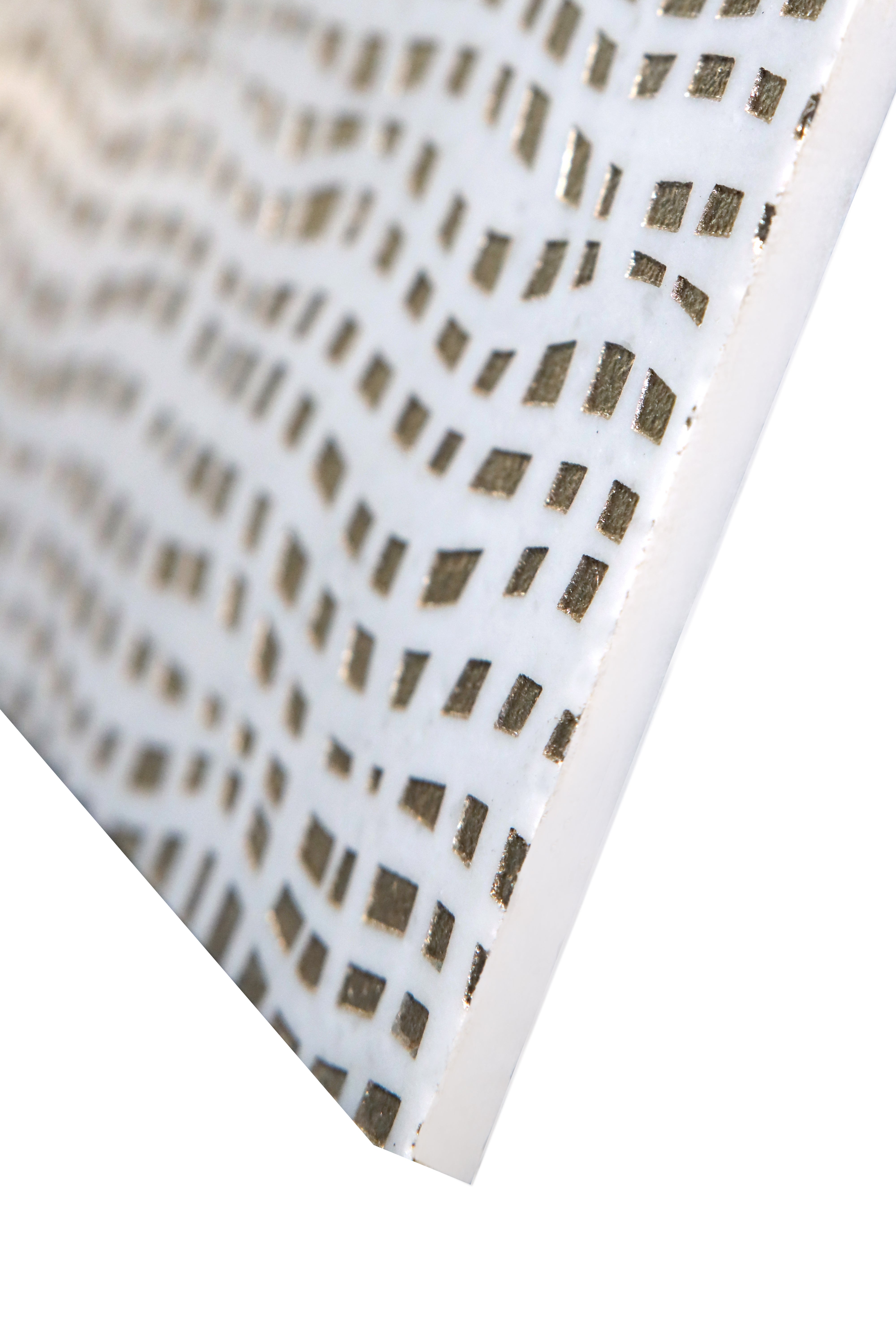 Textured white marble tile with light and shadow highlighting surface depth