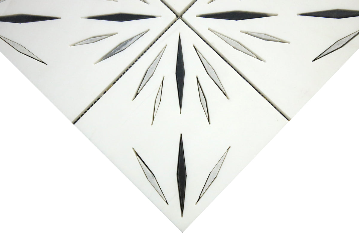 Close-up of white grey and black marble waterjet mosaic showing precise cuts