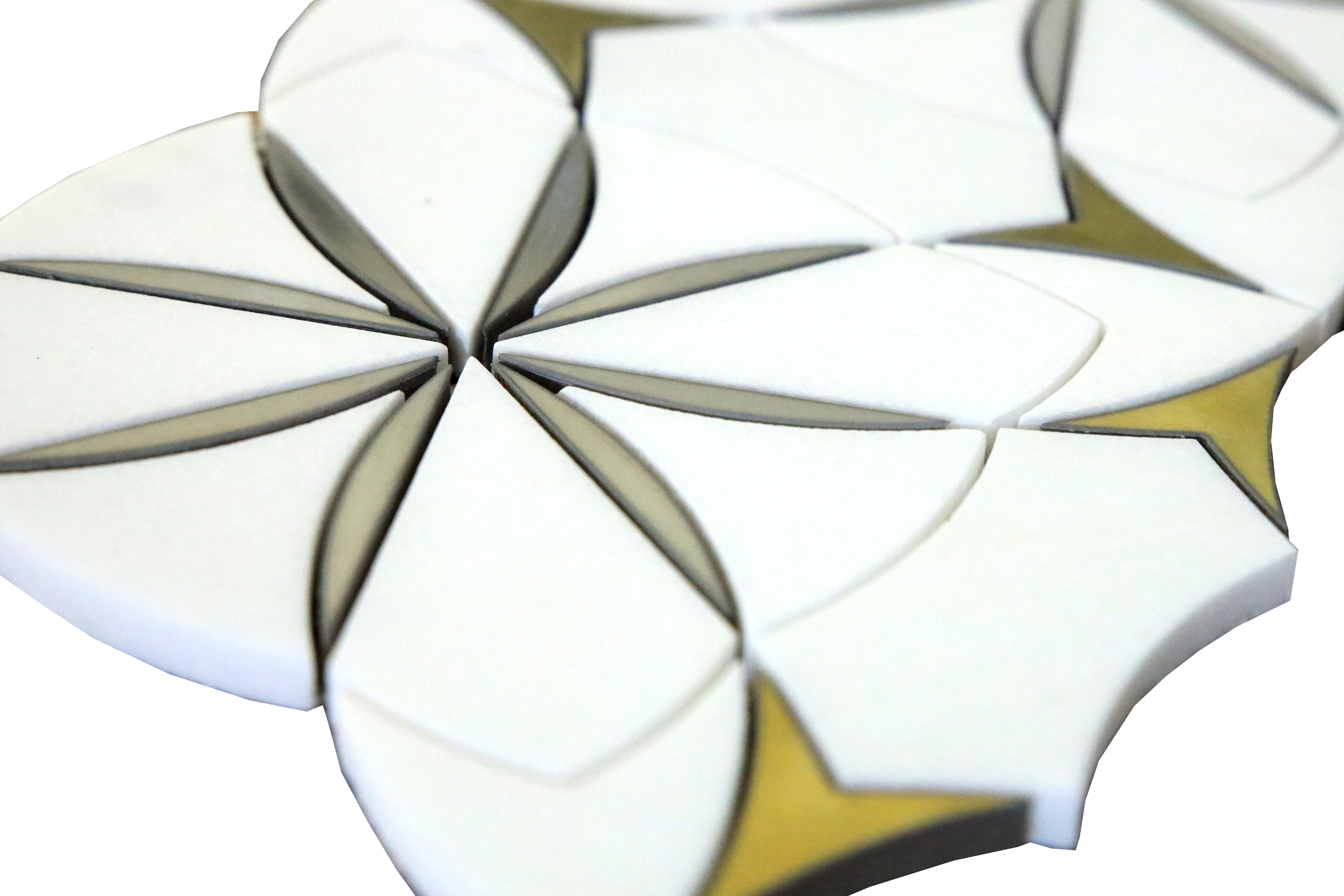 Close-up of Waterjet Monaco Thassos marble mosaic with brass accents