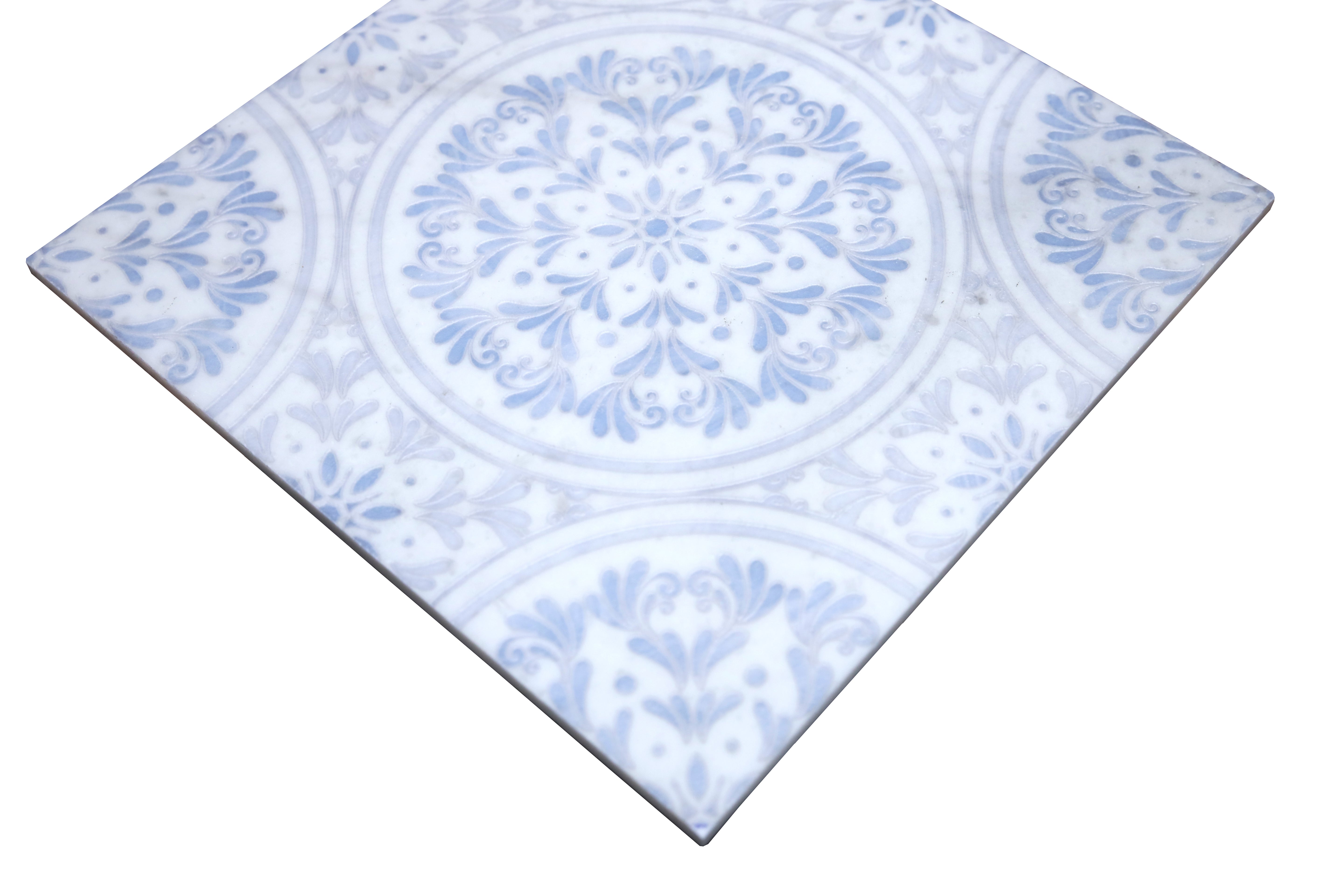 Close-up of Amelia Iris marble mosaic showing blue floral ornamental detailing
