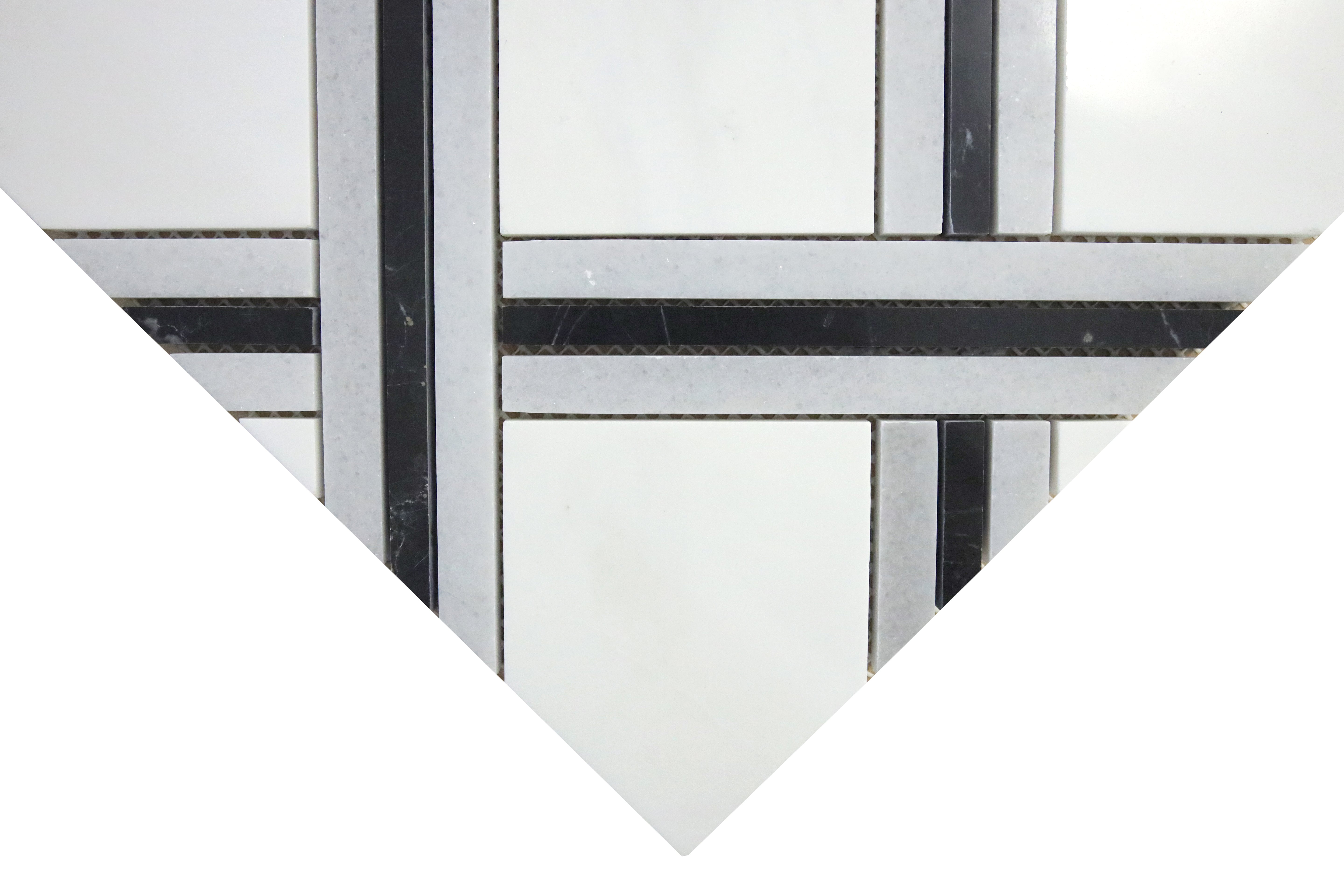 Close-up of polished Dolomite and black marble mosaic tile with linear detailing