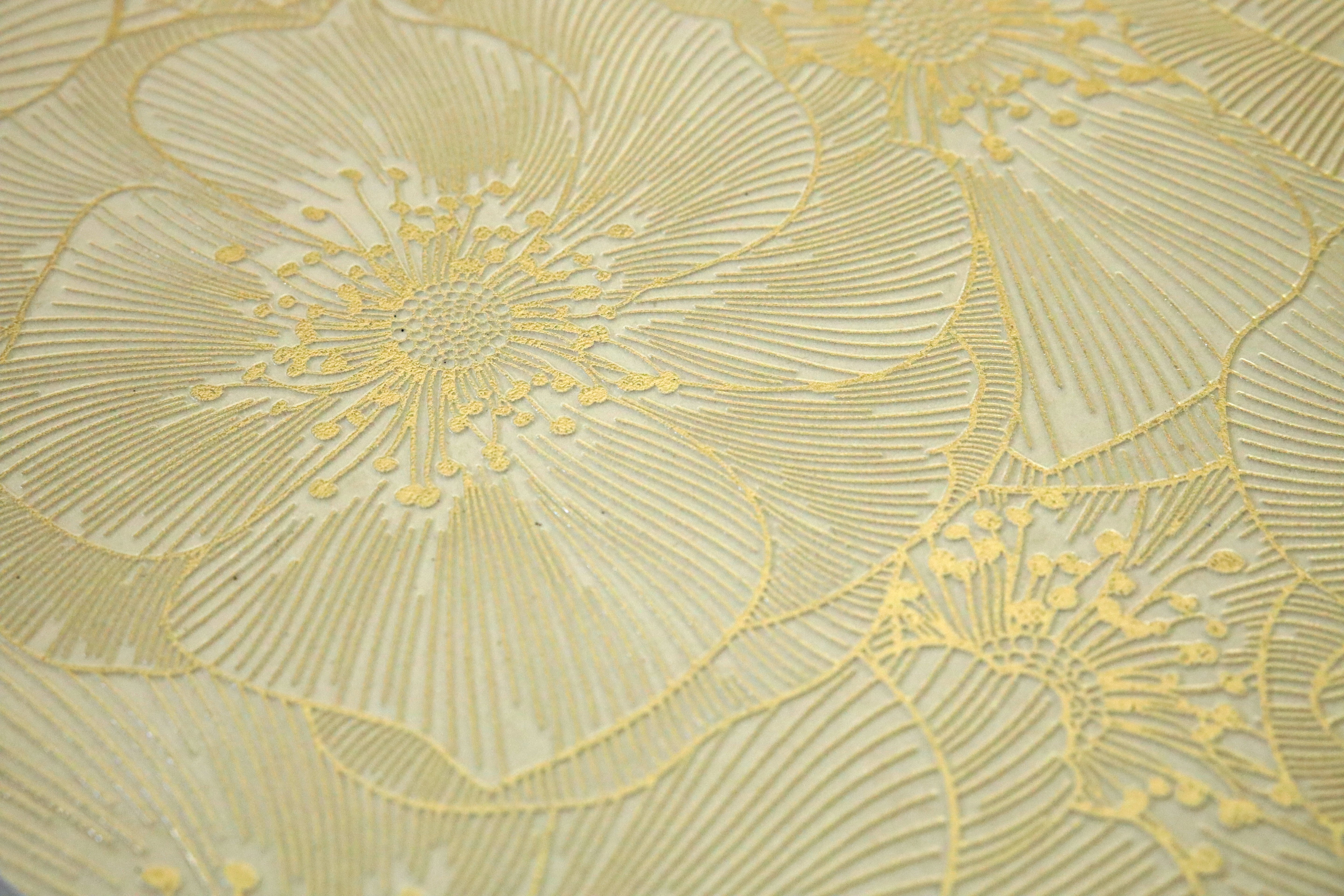 Blossom Gold floral decorative tile installed on a luxury feature wall