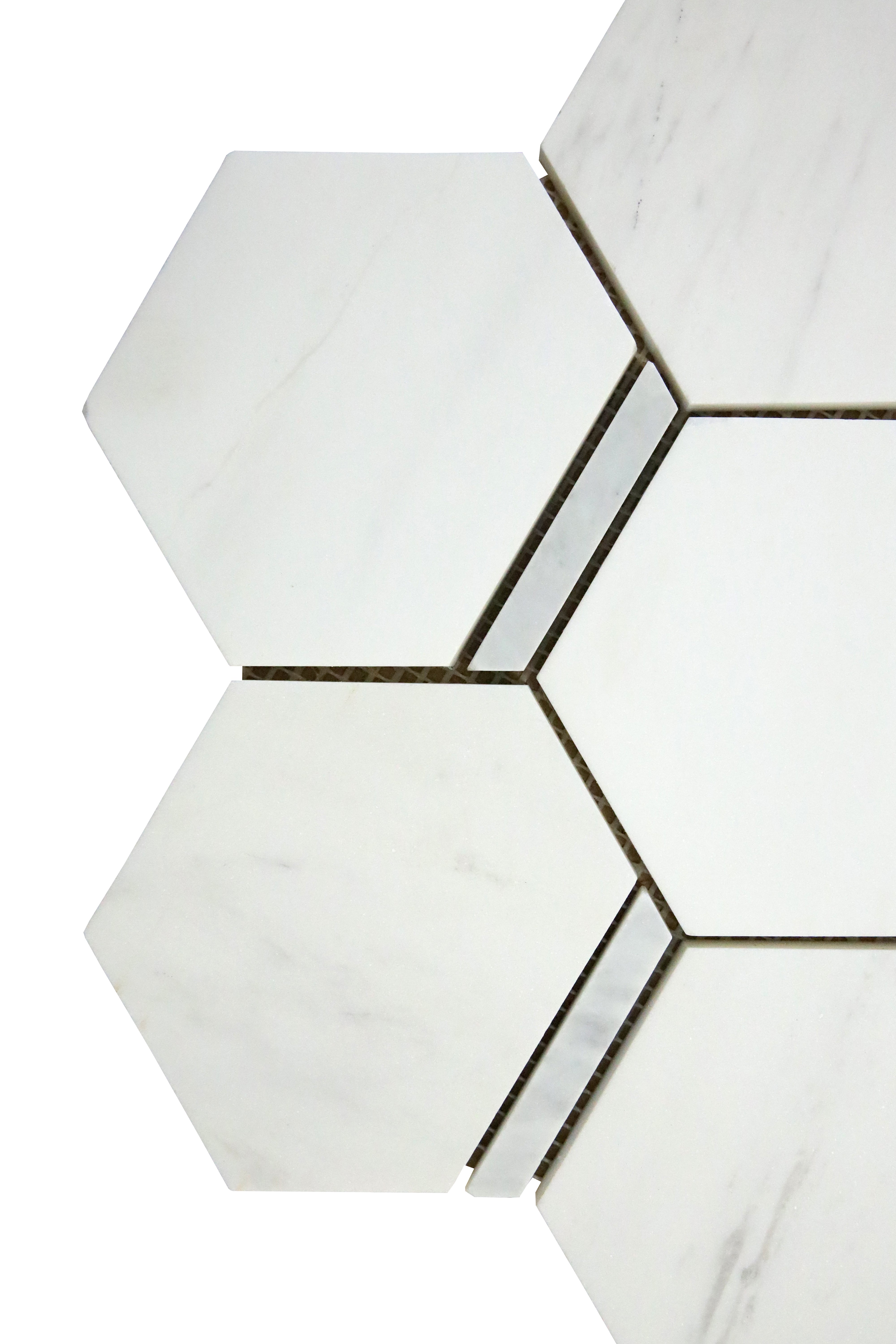 Dolomit Hex with Carrara Strip marble mosaic tile installed on a luxury bathroom wall