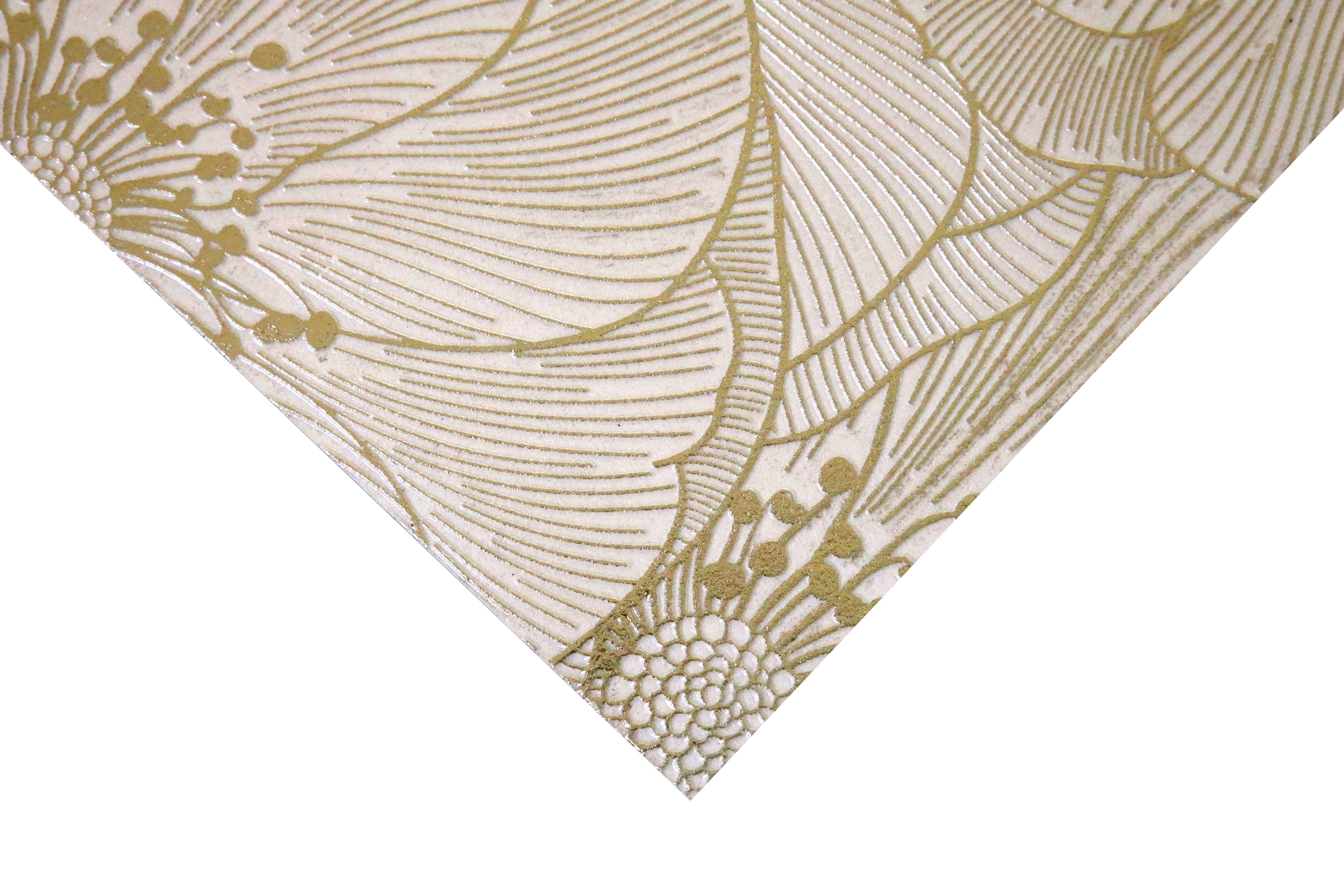 Close-up of Blossom Gold decorative tile showing engraved floral detailing